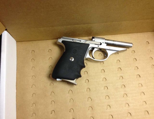The suspect's gun, recovered at the scene
